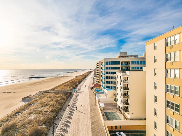 Discover beach living at its finest in this 1-bedroom coastal co-op in Long Beach! This open concept unit boasts a modern kitchen with stainless steel appliances, flowing seamlessly into the living & dining area. A versatile bonus room, complete with a beautiful barn door is perfect as a home office or a second bedroom. Step onto your terrace and soak in the ocean, the perfect backdrop for morning coffee or evening relaxation. The building offers many amenities, including a large gym, inground pool, and convenient laundry located on every floor. Located directly on the beach this is your opportunity to enjoy the sun, sand and ocean just steps from your door!