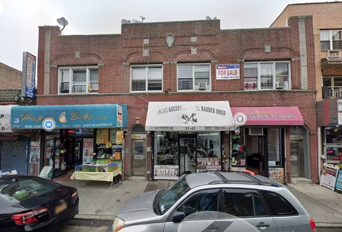 Great location on busy area. 3 store on ground level and 6 apartments are on 2nd floor.