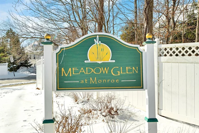 Discover this exceptional End Unit townhouse located in the desirable Meadow Glen community of Monroe, NY. This unique property boasts four spacious bedrooms and 2.5 bathrooms, making it the only unit currently available with a fourth bedroom. The home features elegant cathedral ceilings, hardwood floors in 1st floor and a formal dining room, enhancing its sophisticated appeal. The large master ensuite includes a luxurious Jacuzzi, while central air and a gas fireplace provide comfort year-round. Enjoy the convenience of a one-car garage and easy access to shopping and major highways for effortless commuting. The gated community offers a range of amenities, including a pool, clubhouse, and tennis courts, perfect for an active and entertaining lifestyle. Being sold strictly AS IS.