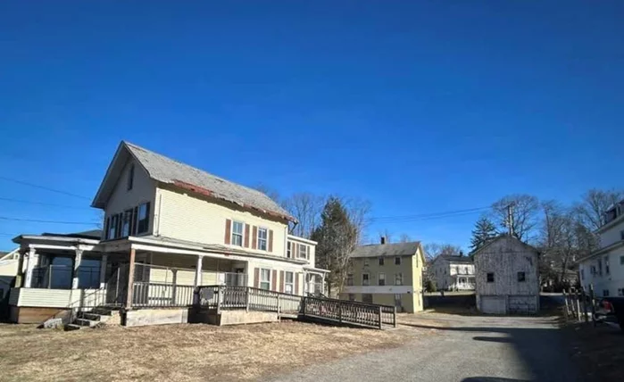 A very unique property in an ideal location near the train station! One large residence (possibly could be made into a 2 family with town approval), another single-family home (11 Oak Street) and a Barn are all on part of this property. This property is in the heart of the Village of Brewster. TLC is needed on all 3 structures. The Village of Brewster is about to go through a massive urban renewal project, and this property is in the zone of this redevelopment.