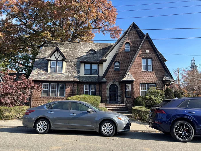 Discover this charming Tudor Gem in Historic Addisleigh Park. This beautifully maintained Tudor-style single-family home, offers an impressive 5 bedrooms, 3 full bathrooms, and a convenient half bath. Boasting 3, 494 of interior square feet, this residence combines classic charm with modern functionality.Situated on a 5, 189 square-foot lot in the heart of the prestigious Addisleigh Park historic district, this home is surrounded by the rich history and unique character of the neighborhood. The property includes a spacious 2-car garage, providing ample storage and parking convenience.Addisleigh Park is a serene suburban-style enclave in southeast Queens, celebrated for its architectural elegance and landmark status. With its vibrant history and close-knit community, this neighborhood offers an unparalleled living experience.Whether youâ€™re looking for timeless charm, generous living space, or a piece of history, this exceptional home will welcome you.