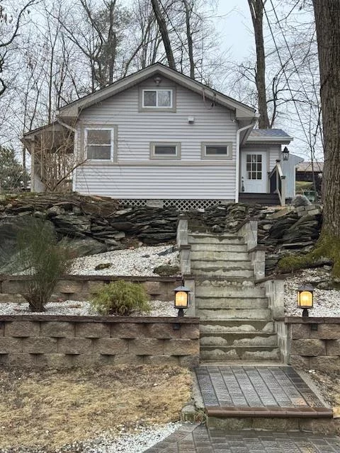 Dreaming of a lake cottage getaway on beautiful Greenwood Lake? This adorable cottage is already completely rebuilt and renovated so all you need to do is a pack a bag and the makings of a nice charcuterie boardâ€¦grab a bottle of wine (or two!) and head up to The Lake. Bedroom on the first floor and a spacious loft for guests. Hardwood floors throughout. Brand new stainless kitchen appliances and a washer dryer hidden behind a custom-made sliding barn door. The cottage is in the private community of Furnace Brook which boasts its own private beach, boat launch and clubhouse. Short walk to the private beach with boat launch and clubhouse. Seasonal water from April 15th through October 15th. Strong potential for conversion to full year water possible. Otherwise, enjoy three seasons for yourself or invest for short term or long-term rental income. Other amenities include: cottage is partially furnished, stone patio, cathedral ceiling, custom tiled bath with tub, enclosed porch, and a shed, too. Terrific price for a brand new cottage in a private lake community!