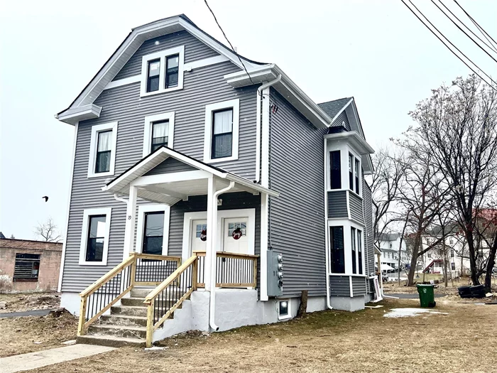 STUNNING MIDDLETOWN MULTI-FAMILY is now available for your purchase!! This Colonial is in C-3 zoning where a Commercial business is allowed on the 1st floor! This 2-family is in turn-key condition and offers all the space that you need with nothing left to do but unpack. Ideal for an extended family, or run your business in the 1st level and live on the 2nd, or lastly allow the rental income of BOTH units pay your mortgage! Current market rental rates of $2, 500+/month for units in this TURN-KEY condition if you are an investor. Both units are completely renovated with high ceilings, modern floors throughout and freshly painted with New updated kitchens with granite counters, New stainless steel appliances fresh out the box, beautiful tiled baths and modern lighting throughout! A 3BR/1BA in the 1st level unit and a 3BR/1.5 BA unit in the 2nd level. New Washer & Dryer in both units for your convenience. Ample storage space in attic and basement. Separate private entrances for each unit. New windows, siding & roof! All new plumbing and NEW mechanicals (New water heater and Combi boiler). Separate electric and gas meters in each unit. Ample private parking all the way to the back that&rsquo;s been FRESHLY BLACKTOPPED! Great commuter location with public bus & train transportation near. Minutes to Touro Medical, OCC, Garnett Medical and to I84. TOUR, OFFER & UNPACK! (Indoor pictures to follow).