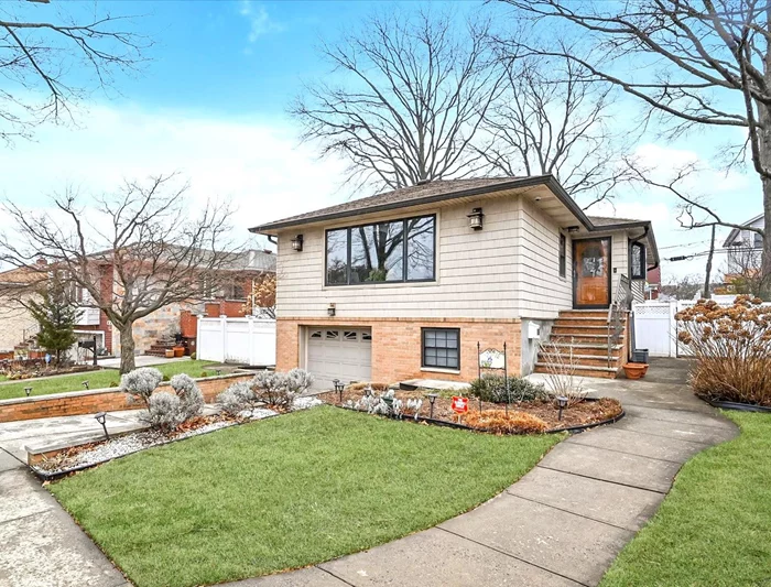 Step into this meticulously maintained single-family Raised Ranch home, located in the sought-after Bay Terrace neighborhood. This charming residence boasts 3 bedrooms and 2.5 bathrooms, offering a perfect blend of modern comfort and convenience. Gleaming hardwood floors flow seamlessly throughout the home, enhancing its warm and inviting ambiance.The stylish eat-in kitchen is thoughtfully designed for both functionality and aesthetic appeal. A standout feature of the home is the expansive basement, offering an open layout that&rsquo;s perfect for hosting gatherings, entertaining guests, or creating a personalized recreational space.Natural light pours into every corner of the home, creating a bright and airy atmosphere. Outside, the spacious backyard is a serene retreat, ideal for relaxation or outdoor entertaining.Conveniently situated near major highways and public transportation, this home provides easy access to everything you need. Located in the heart of Bayside, this property combines prime location with contemporary living.Don&rsquo;t miss this incredible opportunityâ€”this home is a must-see!