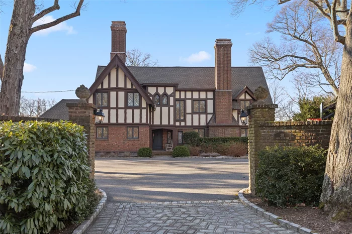 This beautifully restored antique English Tudor home seamlessly blends classic Old-World charm with todayâ€™s sophisticated, modern conveniences. Nestled on a meticulously landscaped 1.2-acre lot, this stunning residence is a perfect blend of history, craftsmanship, and luxurious living. The home features intricate architectural details which have been thoughtfully preserved and enhanced to create a warm, inviting atmosphere.Inside, the home boasts spacious living areas, including a formal living room with inviting window seat, grand fireplace and coffered ceiling, a chefâ€™s kitchen with top-of-the-line appliances, formal dining room and a light and bright sunroom. Upstairs, youâ€™ll find a total of 5 bedrooms, including a primary ensuite with a new spa-like bath and enormous walk-in dressing room with separate shoe closet. In addition, there is a separate back staircase leading to a potential guest suite with new bathroom. A new roof, cesspool system, and updated heating features are just some of the other updates.The grounds are just as impressive. The property is adorned with lush, mature plantings, providing year-round beauty and privacy. A fully fenced backyard includes a spacious patio and gorgeous Gunite pool making it the perfect space for outdoor gatherings or tranquil solitude. Located in the Incorporated Village of Belle Terre, this home provides not only exceptional luxury but also access to an array of unique amenities. Residents enjoy the beach on Long Island Sound. Whether youâ€™re looking to escape the bustle of everyday life or entertain in style, this home provides the perfect balance of sophistication and comfort. A rare gem in Belle Terre, offering not just a residence but a lifestyle.