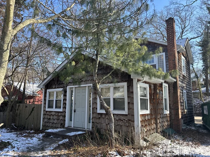 Priced to Sell!! Great opportunity. 2 Bedroom 1 Bath Home with Full Basement with Outside Entrance. Living Room Dining Room w/ Cathedral Ceilings. Kitchen w/ Wood Cabinets and Granite Counter Tops. Home needs TLC.