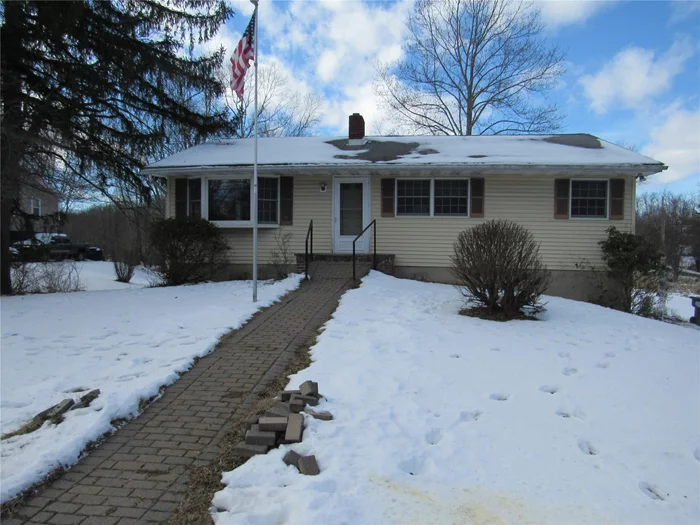 Buy of the Year! Needs some updating, but price reflects it! Cute 2 BR Goshen Ranch is set on .38 A. LR has fireplace and big bay window and opens to dining area. Oak cabinetry in kitchen has lots of storage and a breakfast bar! HW floors, Andersen windows and solid wood doors! Unfinished basement has sliders to yard! Huge walk in closet in one of the BRs. Minutes to Goshen Schools and convenient to Goshen village! Home is being sold AS IS!