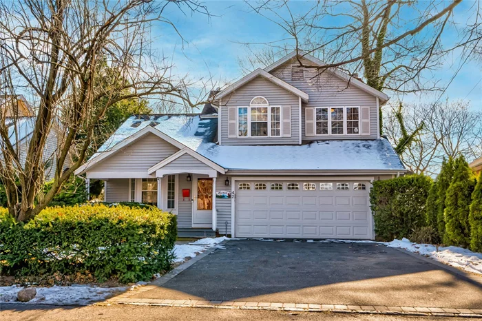 Experience breathtaking water views of Mill Pond and Manhasset Bay from this bright and spacious 4-bedroom, 3.5-bath front porch colonial, built in 1991. Thoughtfully designed for comfort and entertaining, this home offers a seamless blend of indoor and outdoor living.Step onto the charming front porch and enter a welcoming living room with soaring cathedral ceilings and glass doors that open to a brand-new composite deckâ€”an ideal spot to relax and unwind while soaking in the tranquil scenery. The open-concept kitchen flows effortlessly into the cozy family room, where a wood-burning fireplace creates a warm and inviting ambiance. A dining area with direct access to the backyard deck enhances the homeâ€™s entertaining potential. Completing the first floor are a powder room and a convenient entry to the attached two-car garage. Upstairs, the serene primary suite features a walk-in closet and an en-suite bath. Two additional bedrooms share a beautifully renovated hall bathroom. The fully finished lower level offers incredible versatility, including a spacious fourth bedroom, a full bath, ample storage, laundry, mechanicals, and dedicated office space.With its picturesque setting and thoughtful layout, this home is a perfect retreat for those seeking both comfort and stunning waterfront views.