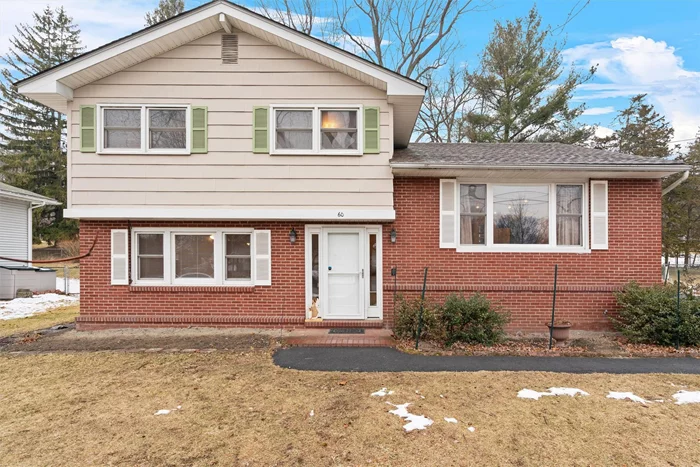 COMING SOON- MOVE IN READY!! This 3bdr 1.5 bath split level home was built in 1960 and loved and meticulously cared for by the same family since 1972. Kitchen, plumbing, appliances and cabinetry upgraded in 2015. Re-insulated and sheet-rocked the attic in 2016. New furnace and new central air installed 2021. Full standby generator installed in 2022, with annual service contract. December 2024- New 30 year roof, with transferrable warranty during the first year.The original wood floors throughout were just refinished.The backyard has a beautifully maintained fish pond, with liner and aeration pump.