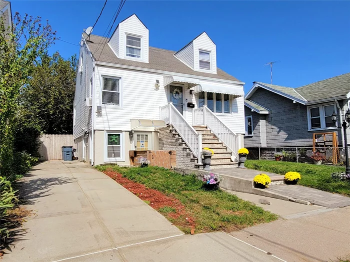 Lovely 4 bedroom cape on a quiet tree-lined street in Old Howard Beach near shopping and transportation. Gorgeously renovated chef&rsquo;s kitchen featuring custom cabinetry and wide-line dining island. This cape features a ground-level walk-in floor legalized as living space. Two upstairs bedrooms, one main level bedroom, and another on the ground floor (with room for a 5th). Two full bathrooms. Two kitchens. Lovely outdoor space with patio deck through sliders off the kitchen, separate play area, and dog run. New hot water heater, new concrete, brand new wood floors, and low taxes., Additional information: Appearance: Excellent, Interior Features: Guest Quarters, Lr/Dr