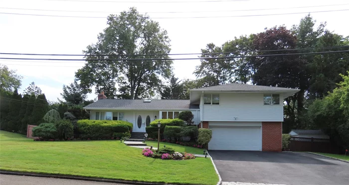 Welcome to Pinebrook Estates where this home offers the perfect blend of comfort and privacy in a quiet neighborhood with a playground. The large, level, fenced-in backyard is a standout feature, complete with a spacious patio, a shed for extra storage, and plenty of room for a potential pool and outdoor activities. This home has been thoughtfully updated, including new wood floors and doors throughout. The generous entrance hall, featuring a skylight, leads into a spacious living room with a beautiful wood-burning fireplace and formal dining room. The home offers flexibility with 3 to 4 bedrooms; the fourth room can easily function as a den or home office. The oversized, updated EIK has stainless steel appliances, granite countertops, water filter system, door to patio/backyard, and features a vaulted ceiling with a skylight, creating a bright and airy space. The large family room with sliding glass doors to the backyard patio is perfect for barbecues and gatherings. The primary bedroom boasts a renovated en-suite bathroom and ample storage. Additional highlights include recessed lighting throughout, custom closets, renovated primary and half bath, a 6 yr old roof, full basement with laundry room, cedar closet and additional storage space, alarm system, 2-car garage, an enlarged driveway for extra parking, outdoor lighting, sprinkler system, 200 amp electric service and a full-house generator for added peace of mind. This home combines a spacious, modern interior with a private, serene outdoor setting, making it an ideal place to call home. Included are the den wall unit, basement gym equipment, brown storage unit and 2 home safes. Convenient to highways and shopping. Move right in! A real gem!