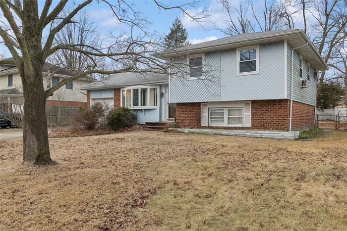 Located in the Country Village section of East Islip ... This spacious 4 Bedroom, 2 Full Bath Home has Oil Heat, Hardwood Floors, 1-car attached garage and a private rear yard. Needs Updating, and Priced to Sell! Make this home your own!