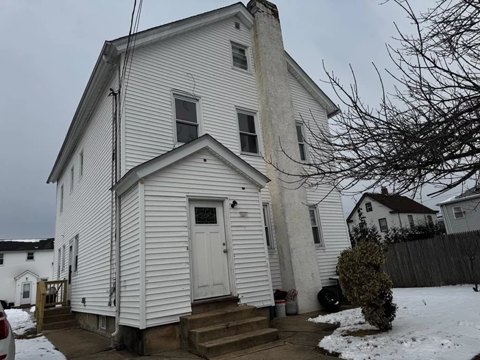 Old Colonial - 2 Family home. 1st Flr Bedroom 3 bedroom, 1 bath, eat-in kitchen, living room, wood floors, recently renovated.