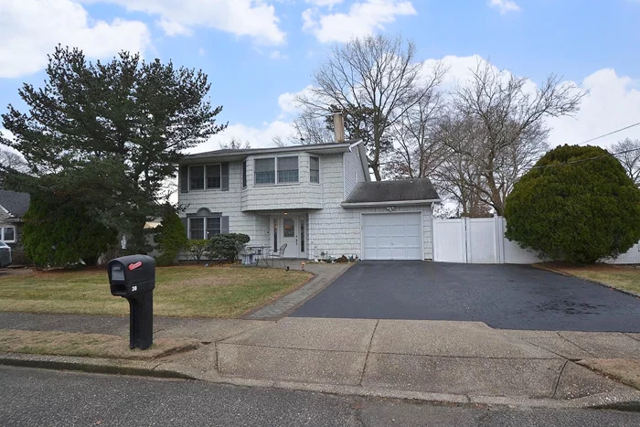 Move right into this well kept 4 bedroom Colonial. The spacious eat-in-kitchen flows seamlessly into the open vaulted family room, that has a skylight and recessed lighting creating an inviting space for gatherings Enjoy both formal living room and dining rooms perfect for entertaining. This home features 1.5 baths and a one car garage for your convenience. The generously sized yard provides ample space for outdoor fun and relaxation. Additional highlights include an accessible attic, plenty of closets for storage, and a sprinkler system. Don&rsquo;t miss this wonderful opportunity to call this great home, set in the Sachem School District with sidewalks and curbs, your own.