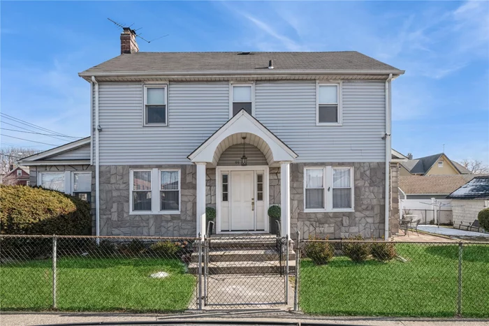 Charming, Renovated 1920â€™s Colonial with Wood Burning Fireplace. Strategically located In Queens Village - Less than a five-minute stroll to LIRR, UBS Arena and Belmont Village Shops. This spacious home sits on a double size corner lot with 1, 600 plus sq ft of living space and is flooded with natural light from sunrise to sunset. Architect-designed open floor plan provides a seamless flow for modem living. Timeless, classic details throughout include, European White Oak hardwood flooring and staircase, recessed lighting, crown molding, solid wood interior doors with top grade hardware and custom finishes throughout. A dream Chefâ€™s kitchen with southern exposures features Imperial Danby Marble and Butcher Block countertops, imported tile backsplash, custom detailed cabinetry, integrated Sub-Zero, Viking, Bosch appliances, eat in kitchen island and many extras. The adjacent formal dining area and spacious living room are perfect for entertaining. A main floor powder room is tucked away for guest convenience. Upper Level includes three spacious bedrooms and two carrara tiled full bathrooms - one with tub. Ensuite primary bathroom with shower, double sinks and radiant floor heating. The primary bedroom features Spacious Closet with customized shelving for maximum storage. Basement with Washer/Dryer, Attic, Detached Garage, Fully Fenced-In Yard Double Lot. Donâ€™t miss this rare opportunity to own a beautifully upgraded home.