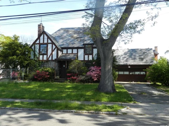 Investor & Builder Special! A rare opportunity in prime Massapequa, surrounded by $1.5M+ homes. This Tudor Revival home offers 2, 800 sqft with expansion potential to 3, 800 sqft by adding a master suite over the garage.Key Features:â€¢Priced at $699K â€“ Huge upside with $1.5M+ ARV after renovations.â€¢Full Rehab Needed â€“ No electricity, heating, or cooling. Estimated $300K in work required.â€¢Cash Offers Only â€“ Not mortgageable due to condition.Amazing potential to restore or expand this unique property. Sold As-Is. Call or text (516)615-5978 for details!