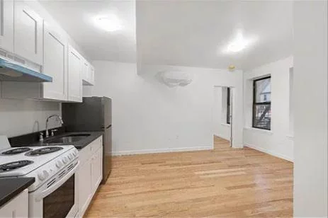 Welcome to 39-21 57th Street, Unit B1, an inviting newly renovated one bed apartment in the heart of Woodside, NY. This charming unit features hardwood floors throughout, a full kitchen with modern appliances, and a spacious bathroom complete with a tub/shower combo. Enjoy plenty of natural light streaming in through large windows, creating a bright and airy atmosphere. Stay comfortable year-round with the convenience of split unit HVAC for efficient heating and cooling. Nestled in a vibrant neighborhood, residents have access to a variety of surrounding activities and landmarks. Discover local dining gems along Roosevelt Avenue, offering diverse cuisines to satisfy any palate. Explore nearby parks such as Doughboy Plaza or take a short trip to Astoria Park for outdoor recreation. With convenient access to public transportation including the subway and bus lines, commuting to Manhattan and beyond is effortless. Experience the best of urban living in this stylish Woodside studio apartment.