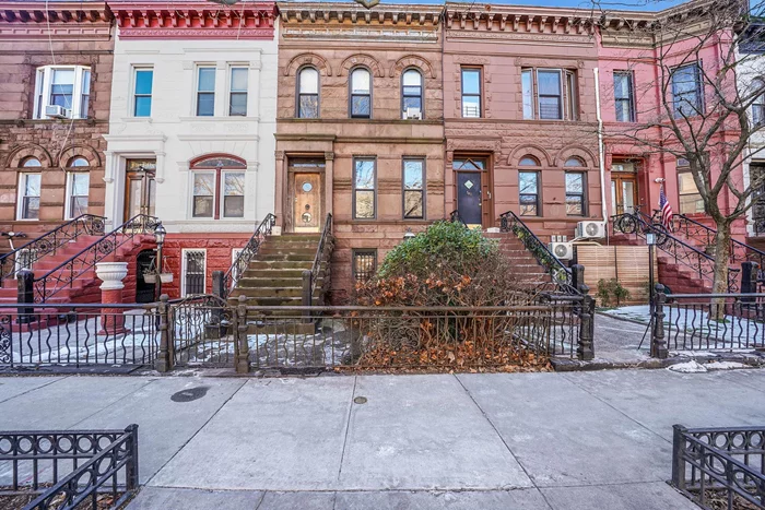 550 Decatur St. paints an enchanting picture of a classic Victorian brownstone in the heart of Bedford-Stuyvesant. Rich with original 19th-century details, this two-family home exudes charm and character, making it a perfect choice for history lovers or anyone seeking a spacious and unique residence in Brooklyn.This home boasts intricate parquet floors, original crown molding, decorative fireplaces and stunning pocket doors. The main entrance offers the foyer and entrance into the living room highlighting the exquisite woodwork of the home. The parlor floor: spacious living room, formal dining room, half bathroom and kitchen. Second floor: two generous bedrooms and one small bedroom, one full bathroom and a walk-in closet for ample storage. The garden apartment is a one bedroom with full bathroom, living room and kitchen for rental income. This conveniently located well-maintained home with over 2400 square feet is a very rare find and it will not last!