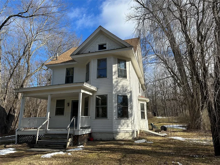 LOVELY VICTORIAN SET ON 1.8 ACRES PLUS AN ADDITIONAL .71 OF NEIGHBORING LOT IS ALL PART OF THIS GEM. THIS IS A LEGAL 2 FAMILY RESIDENCE. GREAT COMMUTER LOCATION IN A QUAINT VILLAGE AREA. PERFECT MOTHER/DAUGHTER. THE MAIN LEVEL STREAMS SUNLIGHT FROM ALL OF THE BEAUTIFUL OVERSIZED WINDOWS. KITCHEN, LARGE LR , DR, BEDROOM & FULL BATH COMPLETE THE LOWER LEVEL. WASHER/DRYER ACCESSABLE TO BOTH APARTMENTS. THIS VICTORIAN BOASTS HARWOOD FLOORS, GORGEOUS ORIGINAL MOLDING & HIGH CEILINGS THROUGHOUT THE HOME. SECOND FLOOR HAS FULL KITCHEN, LR, DR, BEDROOM & FULL BATH. THIRD LEVEL ALLOWS FOR ADDITIONAL BEDROOMS, OFFICE, PLAYROOM, ETC. MECHANICALS IN THE BASEMENT ACCESSED FROM INSIDE THE HOME & BILCO DOOR OUTSIDE.  THERE IS AN OVERSIZED GARAGE/BARN WITH ELECTRIC & UPPER LEVEL. PROPERTY IS QUITE PRIVATE AND PARTIALLY WOODED WITH SOME SLOPING IN THE BACK. GREAT FOR OUTDOOR ACTIVITIES. SPEND MORNINGS SIPPING COFFE ON THE FRONT PORCH ENJOYING THE COUNTRY SETTING. MORE PHOTOS COMING. SIGN WILL BE ON SOMETIME THIS WEEKEND. TOTAL TAXES FOR BOTH PARCELS IS $7710.04