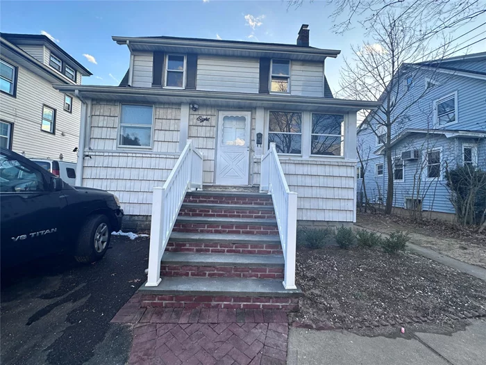 Newly renovated home with brand new appliances, flooring, ceramic tiled floors, new kitchen and new bathroom. House with modern lighting and cabinets. House is conveniently located in an incorporated village, near shops, schools and LIRR. Express trains available to Penn station in 30 minutes. Move in ready.