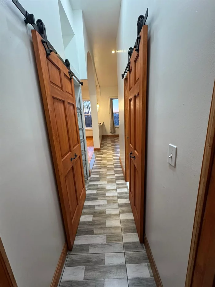 2nd Floor 3 Bedroom Unfurnished Apartment Featuring Wood Floors, Beautiful Barn Doors in Hallway. Tenant Pays Electricity and Cooking Gas. Can be a Room Mate Situation as well. No Smoking & No Pets. Must See. Great Space for Relaxation. 24 Hours Appointment request.