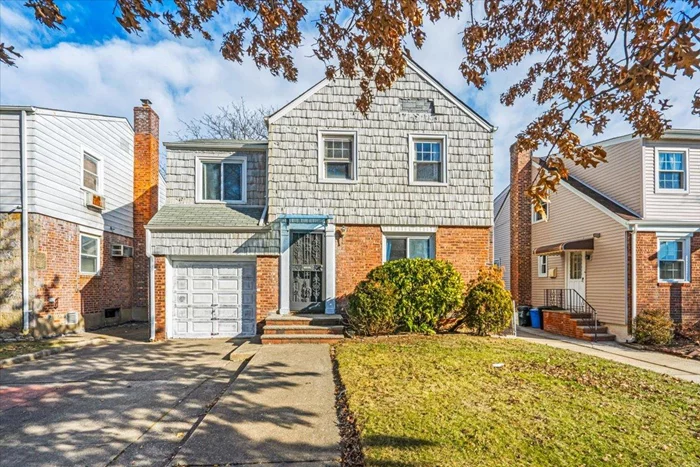 Uncover the potential of this charming colonial single-family home in the desirable Bayside, Oakland Gardens neighborhood. While this residence boasts a classic layout, including a spacious living room, formal dining area, and three bedrooms, it awaits your vision and updates to make it truly shine.The upper level has 3 bedrooms and a full bath, while the semi-finished basement offers additional living space. The expansive backyard presents endless possibilities for outdoor activities and customization. With attached garage , and parking for two cars, the property also delivers practical amenities.Conveniently located near shops, restaurants, H Mart, Kissena Park Golf Course, and Northern & Francis Lewis Blvd, public transportation is easily accessible with Q76, Q17, Q31, and Q88 buses nearby. This home, situated in School District 26 and zoned for PS 162, JHS 074, and Francis Lewis High School, offers excellent opportunities for families willing to invest in upgrades.With low taxes of $8, 400 and generous lot dimensions of 40 Ã— 97 ft, this property is a fantastic investment for those ready to roll up their sleeves and create their dream home. Donâ€™t miss this opportunity to add value and style to a home in a sought-after location!