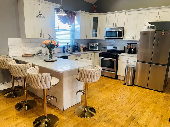 Large 2 family in Throggs Neck featuring a 3 bed 2 bath (rented for 3300) and another three bdrm over a fin basement. No parking/driveway, gas heat, two boilers, updated kitchen and baths in both units. High ceilings in top unit.