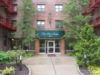 Beautiful grounds, well maintained elevator building, Very Large 1 king size bedroom with two double closets, EIK fits table and chairs, Dining room living room very spacious. Maintenace includes gas, electric, water taxes heat. Walk to stores restaurants and busses E & F train near and Long Island Railroad close by. Clearview Expressway, Cross Island Parkway and Grand Central parkway and LIE close. Call for more information!