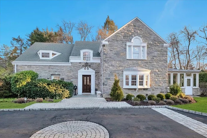 Chockfull of character and charm, this Wykagyl Park masterpiece graces over a half acre of extraordinary corner property on one of New Rochelle&rsquo;s most coveted streets. With magnificent curb appeal and stunning original architectural details perfectly paired with modern updates, it&rsquo;s easy to fall for this beauty. The phenomenal, spacious floor plan checks off all the boxes- featuring a stately foyer entrance, a grand living room with fireplace, a large formal dining room, a Butler&rsquo;s pantry, an incredible new kitchen, a first floor bedroom with a full bath, a private first floor office with fireplace, multiple family rooms, a mudroom, an amazing primary suite, all bedrooms with ensuite updated baths and a fantastic, finished walk-out basement. This is a one-of-a kind gem. The designer, large eat-in kitchen was just renovated in 2022 and showcases extensive custom cabinetry, stunning veined 3 quartz counters, a 42 SubZero refrigerator, two Thermador ovens, induction range, double sinks, two dishwashers, wine frig and more. The expansive living room boasts dentil crown molding, decorative columns and a marble fireplace, and the large formal dining room presents magnificent chair rail molding, a contemporary chandelier and expands to the beautiful Butler&rsquo;s panty. With a wood burning fireplace, the private office/den enjoys beautiful views of the prestigous Wykagyl Country Club golf course. The inviting family room embraces original stone work and wall-to-wall windows. Enjoy the exceptional primary suite complete with a walk-in closet, dressing area with multiple closets, and a renovated ensuite bathroom featuring double sinks and a large shower with multiple showerheads. The remarkable lower level provides 1271 sq ft of bonus space including a second family room with fireplace which walks out to a magnificent stone patio courtyard, a playroom which could also potentially be a 6th bedroom, a large full bathroom and extensive storage. This special haven boasts a beautiful, flat backyard with a stone patio, mature plantings, a basketball court and plenty of privacy. Additional meaningful updates include: automatic home generator, new hot water tank (2021), new furnace (2021), new chimney (2021) and new air condensors (2017). All this, near shopping, schools, restaurants, worship, golf, parks and transportation.