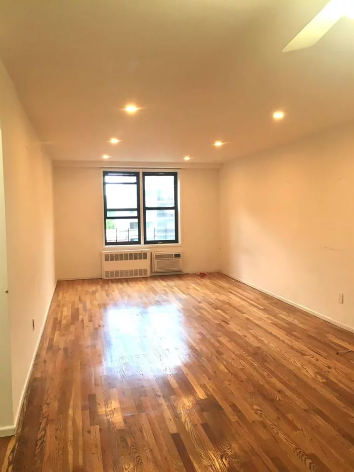 Location Location Location On fifth floor, spacious and sunny 1b1b in heart of flushing! NO Flip Tax. Rent allowed after one year. Low Maintenance, all utilities included but Electric. Huge Closet in the Bedroom. bright open kitchen. Convenient To All Transportation. Q28, Q13, QM3 Buses. LIRR-Murray Hill station #7 train subway. ONLY 1 street away to supermarket- H-mart or GW supermarket( DaZhongHua) , Bank, Rite aid, gas station, Restaurant, Stores and so on. Must see!