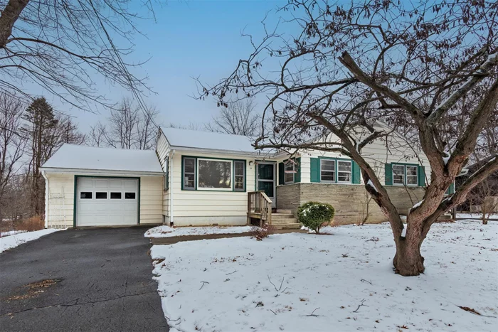 Sweet, light filled,  2 bedroom, 1 bath duplex located in Rhinebeck Village. Hardwood floors throughout the living room and both bedrooms. Ceramic tile in the kitchen and the bath which provides a tub/ shower combo Just installed counter tops in the kitchen, bath and new ceiling fans. The washer and dryer are located in the generous and mostly finished basement. Attached one car garage and privacy fence in the back yard.  Great location, side street, short distance to the center of the Village.