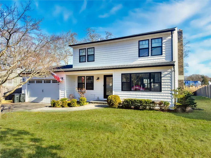 Welcome Home to this beautiful Waterfront 4 bedroom, 2.5 bathroom in the desirable area of Holiday Beach. Completely remodeled in 2022 this Colonial offers a new roof, new windows, and a large Trex Deck that overlooks the canal. The inside features a gorgeous eat in kitchen with granite countertops, farmhouse sink and updated stainless steel appliances. It also has crown molding throughout, tons of natural light with skylights and an open floor plan. Plus an attached 2 car garage. Do not wait to call this home yours!