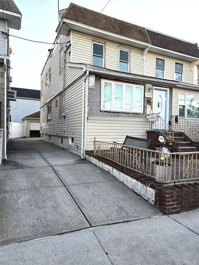 This legal two family shell with full ceiling height open concept basement, is an all cash investor&rsquo;s delight. This structure previously sustained mostly water damage from a fire, was professionally gutted, and has already been partially restored. The property was functioning as two separate two bedroom apartments, with one full bathroom in each, and an OSE open basement with a large full bathroom to the rear. Last year, a brand new roof was installed along with a skylight, and various new windows and doors were put in. Most rooms are already laid out with framing. New boiler and hot water heater. Wide shared driveway leads to private garage parking. Typical DOB fire construction violations on record. Being sold completely as is to non-mortgage buyer. Negotiable.