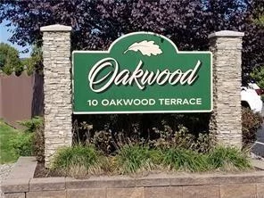 This stylishly updated & well maintained unit in Oakwood has everything you need to live not only comfortably but affordably! While the galley style kitchen may be compact it has BIG impact- beautiful detailed cabinets( lots of storage!) & open shelving against the subway wall tiles on the backsplash! The appliances are in great condition & the wall a/c unit was recently replaced. The renovated, spacious bathroom offers an updated tub & surround, vanity, sink, toilet, mirror & lights! The bedroom has plenty of room for the largest bed & has a double wide closet as well! PLUS, the entire unit has just been painted!! Oakwood provides lot parking, snow & trash removal & all exterior maintenance! Electric for this unit averaged only $120/month (cost may change depending on personal use). No more mowing or shoveling! So whether you&rsquo;re starting out or downsizing, come check out this e-z living unit! Own cheaper than renting! You&rsquo;ll be glad you did!