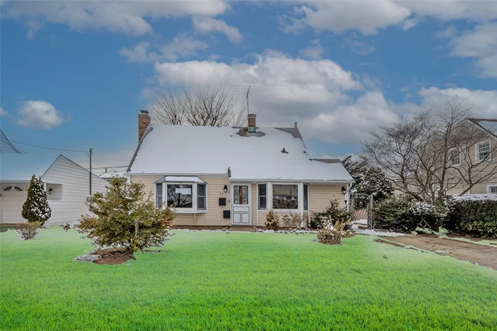 Charming 4-bedroom, 1-bath cape situated in the heart of Levittown. Enter the spacious kitchen with convenient access to the backyard. Enjoy the bright and sunny living room, complete with a wood fireplace. The main floor features a hall bath, one bedroom, and an additional room with sliders to the backyard, which can serve as a dining room, office, den, or extra bedroom. Upstairs, there are two generously sized bedrooms. The backyard provides ample room for entertaining. Priced to sell, this home will not last long! Schedule your showing today.