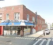 Nestled in the bustling commercial zone of Ozone Park, this exceptional corner property offers a perfect blend of prime location, versatile usage, and lucrative income potential. Rarely does an opportunity like this come to market! Unique L shaped lot offering additional space for parking and a garage â€“ a rare and valuable feature in the area. Level-1 Commercial Space: Currently occupied by a long-standing daily business with a solid tenant who plans to stay, ensuring steady income. Three Residential Units: Each unit features two bedrooms and one bath, generating strong rental income. Situated on a prominent corner in Ozone Park, this property enjoys maximum visibility and high foot traffic, making it ideal for continued commercial success. Its proximity to major transit routes, shops, and local amenities adds to its desirability. With established tenants in both the commercial and residential spaces, this property is a turnkey investment. Whether youâ€™re an investor seeking a strong income-generating asset or a business owner looking for the perfect location, this property is a must-see. Opportunities like this are rare and highly sought after in Ozone Park. For additional information or to schedule a private tour. This extraordinary property wonâ€™t last long!