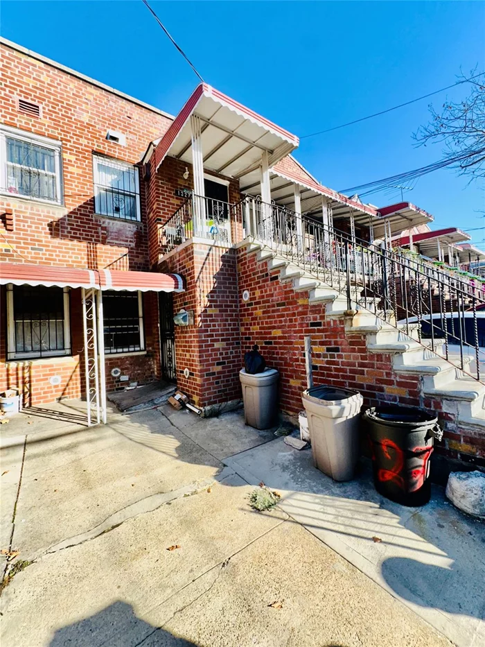 Hello Canarsie, Welcome to this solid brick two- family attached home nestled on a picturesque, tree lined residential block in the heart of Canarsie, The top floor comprises two bedrooms, one bathroom, a spacious living room, a cozy dining area, and a kitchen. The first floor features a one-bedroom apartment with an eat-in kitchen, one bathroom, and a living room. The property features a substantial full basement, but it does require some attention and care. Additional highlights include a private driveway with a one-car garage and a backyard suitable for entertainment and gardening. The location is convenient, situated close to Canarsie Park and Seaview Park, public transportation, reputable schools, and a variety of local amenities. Don&rsquo;t miss out on this fantastic property!