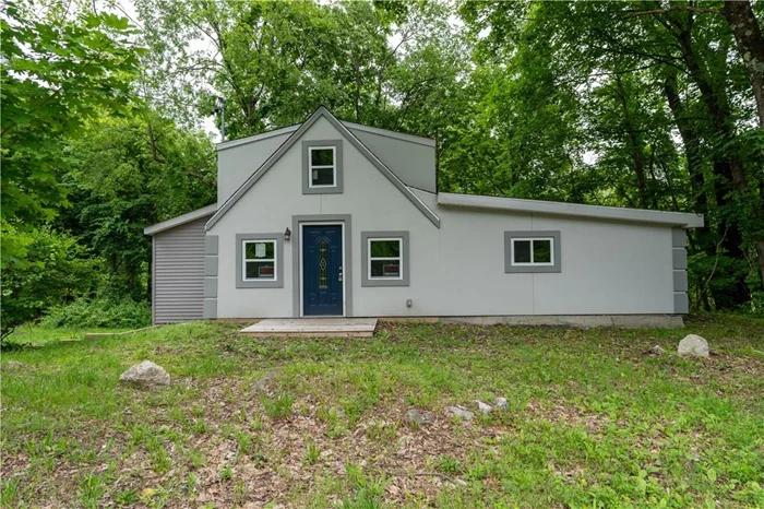 New Paltz! Looking for something different? This newly renovated chalet home is sitting on 8 acres of privacy! Surrounded with nature, this homecan be used all year round, or for a cool getaway! Easy to move into, this home features a new wood kitchen with stainless appliances andgranite countertops, renovated baths, new flooring, new siding, new roof, mostly new windows, new electrical, plumbing, new HW heater andmore! Being sold As Is.