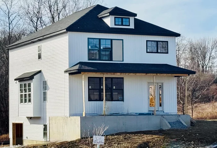 Currently under construction and ready for occupancy by Summer. This modern farmhouse-style home features a stylish exterior with a hip roof, board and batten siding, and a front porch with beautiful views of Mount Beacon. Inside, the thoughtfully designed open layout includes a two-story entry foyer, inviting living room, dining room with tray ceiling, private study on the first level, and chef&rsquo;s kitchen with custom Merrilat cabinetry, quartz countertops, huge center island, large walk-in pantry, and SS GE appliances including a hood with exterior venting. The luxurious primary suite features mountain views, a large WIC, and an en suite bath featuring a double vanity, quartz countertops, and stylish 60 x 42 tiled shower. More quality features include: Energy Efficient High Performance specs, municipal water and sewer, 2-zone high performance heat pump with central A/C, blacktop driveway, and landscaped level property. Only 2.5 miles from the Beacon Train Station, one mile to Main St, & 60 miles to NYC. Built by Rieger Homes, see builders website. Other lots & home styles to chose from. See Floor plan and community brochure.