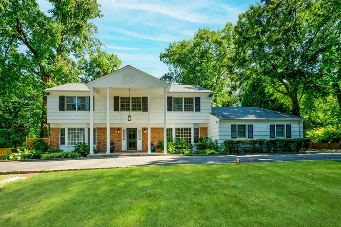 Welcome to this Sands Point Gem! Meticulously maintained and classically elegant 5-bedroom, 3.5-bath, center hall colonial&#160;home, blending timeless charm with modern updates, offering the perfect backdrop for your next chapter. As you enter, you&rsquo;re greeted by a bright and airy foyer that leads into the expansive living areas. The generous, sun-drenched living room features dentil molding, hardwood floors and French doors to the yard. Adjacent is a window lined den with vaulted ceilings, exposed brick wall and gas fireplace. The chef&rsquo;s eat-in-kitchen is equipped with top-of-the-line stainless steel appliances, abundant custom cabinetry and granite counters. A gracious formal dining room with bay window is perfect to gather. A first-floor bedroom, full bath, laundry room and powder complete this floor. Upstairs youâ€™ll find, the primary suite with ample closet space and an updated spa-like en-suite bathroom, and three additional well-sized bedrooms and an updated full bath. Lower-level recreation, storage, and mechanicals. Set on an incredibly private, and lushly landscaped shy acre, with multi-level decking and a saltwater, heated in-ground pool, you&rsquo;ll never want to leave home! Generator, CAC, 2 car garage with 2 EV chargers. Access to the Sands Point Village Club with dining, pool, tennis and golf.