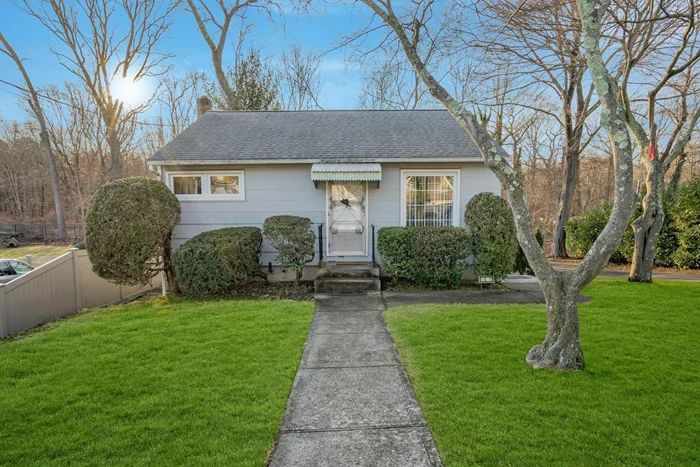 Welcome to 18 Fairview Place, a cozy 2-bedroom, 1-bath cottage nestled on a .2-acre lot in the heart of Hauppauge. This home features oakwood hardwood floors in the living room and both bedrooms, with laminate flooring in the kitchen. The kitchen is equipped with a gas cooking stove (propane) and a brand-new stainless steel dishwasher.The home offers hot water baseboard heating, with a 10â€“12-year-old burner located in the unfinished basement, which also houses the laundry area and an above-ground oil tank. Window units provide air conditioning. The Andersen windows throughout the home are all new, bringing in natural light while enhancing energy efficiency.A one-car garage is located on the lower back side of the home, accessible through the basement. The property backs up to private woods leading to the Nissequogue River, creating a peaceful retreat. Shopping centers, the Northern State Parkway, and I-495 Expressway are all nearby, adding to the home&rsquo;s convenience.Located in the Hauppauge School District, this home comes with low taxes of $7, 334.75. Don&rsquo;t miss this opportunity to own a charming and well-located home in a desirable community!