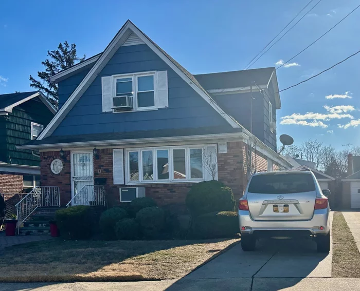 Legal One Family being used as a 2 Family. Located in North Rosedale. 5 Bedrooms, 3.5 Baths. Detached One Car Garage, Private Driveway. Hardwood Floors throughout. Full Finished Basement.