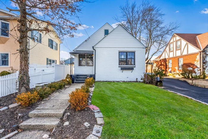 Welcome Home to this Stunning 5 Bedroom 3 Full Bath Home in West Hempstead. This is a spacious two-story home that blends classic elegance with modern amenities. This style typically features a symmetrical facade with a central entrance, large windows, and traditional architectural details with brick and new siding exteriors, decorative moldings, and a welcoming front porch.Inside, the home offers a well-balanced layout with formal living and dining rooms, as well as an open-concept kitchen and family room for modern living. The updated aspects include a remodeled kitchen with high-end appliances, quartz countertops, custom cabinetry, and stylish lighting. Bathrooms have been modernized with contemporary vanities, tiled showers and soaking tubs giving you a spa type feeling. This Updated Colonial comes with New Windows and Doors ,  New Sidings , New Driveway , New Kitchen , New Bathroom, New Appliances , New Plumbing , New Electric , New hardwood Flooring . A well-manicured backyard and detached garage with New garage Doors making this colonial perfect for both everyday living and entertaining. Virtually Staged.