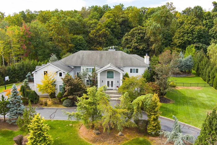 Custom colonial, 9488 total sq ft, built by original owners. Grand entrance flows into the formal dining room, family room and living room each feature a gas fireplace. 2 bedrms on the main flr. Kitchen is equipped w/ stainless steel appliances, granite countertops, & lots of storage. The island features 5 burner stove with hood, and built in oven. Radiant tiles in entrance, kitchen and master bath. Upstairs, the spacious primary suite comes complete with walk in closets and a spa like ensuite bath, which features a beautiful skylight, soaking tub, his and hers vanities, and standing glass shower. 5 addl bedrooms through the 2nd floor, each with plenty of closet space and their own baths. The fully finished walkout basement features 10 ft ceilings, a fully equipped accessory kitchen, family room, recreation space, and full bath. The backyard is an oasis, with large deck for entertaining, inground pool surrounded by stone patio, and natural privacy fence. Home comes w/ a full generator. Additional Information: Amenities:Storage, ParkingFeatures:3 Car Attached,