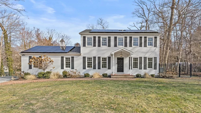 Welcome to 97 Hallock Road, a stunningly renovated center-hall colonial that perfectly blends elegance, comfort, and charm. Set on .75 acres in Rocky Point, this exceptional home boasts four bedrooms and four full baths, offering an exquisite living experience.Step inside to find wide plank flooring throughout the main living areas. The open-concept chefâ€™s kitchen is a culinary dream, and the heart of the home, featuring gas cooking, a stainless-steel appliance suite, quartz counters, island seating and an eat-in area that overlooks the backyard through a sun filled bay window. Off the kitchen is your vaulted family room where a wood-burning fireplace and sliding glass doors lead to an inviting back deck, creating the perfect space for relaxation and entertaining.A thoughtfully designed mudroom offers ample storage, laundry facilities, and a full bath for added convenience. The finished basement, complete with an outside entrance, full bath, and additional storage, provides endless possibilities for guest accommodations, a home office, or a recreation space.Enjoy year-round comfort with central air conditioning and gas heat, while 55 fully owned solar panels ensure maximum energy efficiency (and no electric bill). Step outside to your private oasis, featuring a saltwater shallow-end-only poolâ€”ideal for warm summer days. The homeâ€™s exterior has been completely upgraded with brand-new siding, roofing, and windows, all backed by a lifetime guarantee. A spacious two-car garage completes this remarkable property.Donâ€™t miss the opportunity to own this exceptional home, where modern upgrades meet timeless charm.