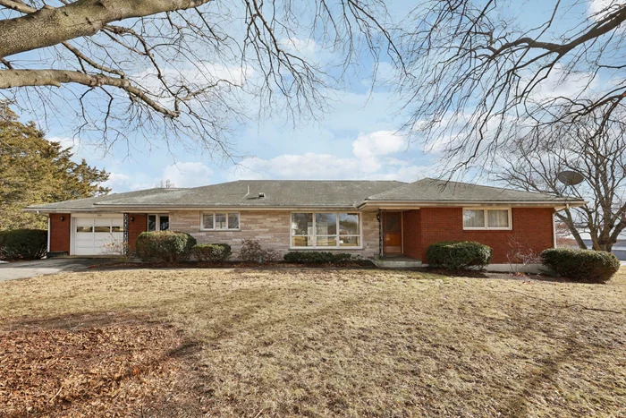 Bricktastic Beauty â€“ A Mid-Century Gem with Space, Style & Sustainability!This solar-powered mid-century brick home is ready for you to make it your own! Offering spacious one-level convenience with thoughtful craftsmanship, this home is ready for you and filled with timeless charm.Step inside to find large windows that bathe the interior in natural light, highlighting hardwood floors, a cedar closet, and a retro kitchen and baths that reflect the character of the era. Designed for function and flow, the home features two entrances, an oversized laundry/mudroom, and a full-length covered balconyâ€”the perfect place to relax while taking in breathtaking mountain views and scenic Pine Island Park.Full walk-out basement provides incredible storage and flexibility, while the garage layout includes a three-car garage on the lower level and a single front-entry garage, complemented by two driveways and an oversized back driveway, providing ample space and flexibility for parking, storage, or workspace needs.Additional highlights include central air, a whole-house attic fan, and solar panels, keeping energy efficiency top of mind. With so much space, flexibility, and charm, this home is a rare find!**Showings by appointment onlyâ€”Home is occupied.