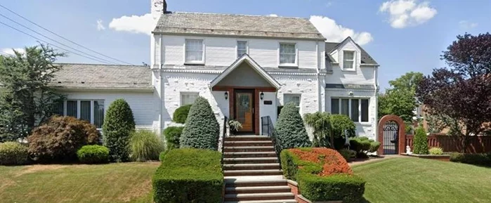 This exquisite 3-bedroom, 3-bathroom residence, located in the heart of Beechurst, NY, offers a perfect blend of elegance and comfort. Nestled on a 60x100 lot, the home is surrounded by lush landscaping and features a private driveway with pavers, adding to its curb appeal. The interior boasts hardwood floors throughout and a luxurious marble master bathroom. Additional highlights include a two-car garage with attic storage. Exclusively listed by Space Finders, this property is a rare find in a highly sought-after neighborhood.Featured Residential Sales.