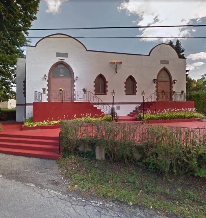 This versatile commercial property, formerly a synagogue, offers a unique opportunity in the heart of Putnam Valley, NY. Featuring a flexible layout, the building is ideal for religious institutions, professional offices, warehouse storage, or other commercial uses. The spacious sanctuary and meeting areas provide ample room for worship services, conferences, or large gatherings, while multiple offices and classrooms make it well-suited for administrative, educational, or business purposes. A fully equipped kitchen and fellowship hall offer the perfect space for hosting events and receptions. The expansive interior includes warehouse and storage space, ideal for inventory, equipment, or even a private car or motorcycle collection. With ample on-site parking and excellent accessibility to major roads and highways, this property is convenient for both business and personal use. Zoned for a variety of applications, it also presents a great redevelopment opportunity for professional offices, community centers, or storage facilities. This is a rare chance to own a multi-use commercial building in a thriving community.