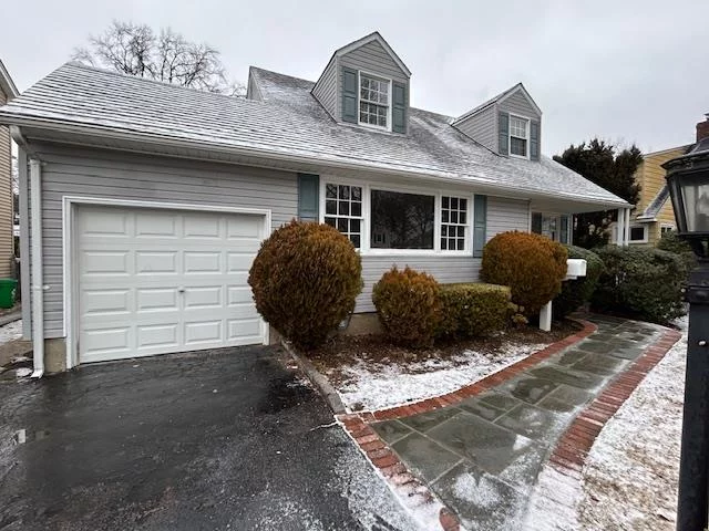 Fantastic 3bdr 2bth Fully Renovated Expanded Cape Cod Home with attractive curb appeal and superb fit and finish. This beautiful home sits perfectly situated mid block on a oversized 60&rsquo; X 130&rsquo; professionally manicured, sunny southern exposure property. Additional notable features include: An inviting front entry porch leading you inside to a bright and spacious living room with recessed LED lighting and freshly finished hardwood floors. Fabulous chefs kitchen addition with custom cabinetry, sleek quartz countertops, trendy industrial farmhouse lighting, new stainless steel appliances, smart glass tile backsplash and a exterior side door which provides access to a large 13&rsquo; x 20&rsquo; rear yard deck space for alfresco dining. Sizable formal dining room serviced off kitchen space. Large family room addition with a cozy wood burning fireplace and 6&rsquo; Anderson sliding glass door for direct access to the rear yard deck/entertaining area. Mechanical features include: New appliances throughout, efficient dual zone gas fired heating plant, designated indirect hot water zone provides endless hi volume hot water, full service laundry station with new impeller less washer & new clothes dryer, maintenance free vinyl siding, architectural roof shingle. The primary bedroom contains plenty of natural light with two large closets providing an abundance of storage space, there are two additional generously sizes guest bedrooms. This home has recently received a fresh professional paint job with warm select color tones throughout. Proximate to: Major parkways, LIRR, restaurants, shopping, multiple top rated parks and all village amenities. Quality built to last functional forever homes with reasonable taxes are becoming increasingly difficult to find... Opportunity Seldom Knocks Twice Will you be ready? ***Note: Professional Photos & Floor Plan To Follow***