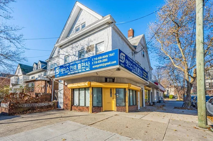 Investors delight, a corner mixed use building with two family and two stores located on corner of Roosevelt Ave and 150th St. Walk to MURRAY HILL LIRR and subway.